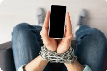 hands chained holding a phone