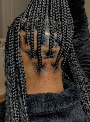 a woman with box braids